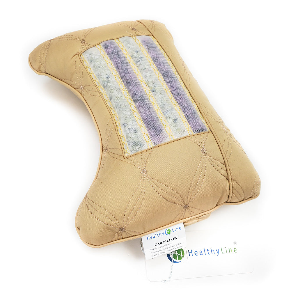 The HealthyLine Travel AJ Magnetic Pillow Firm InfraMat Pro® is a tan orthopedic neck support pillow featuring a quilted design and a multicolored fabric strip. It combines magnetic stimulation with comfort for optimal relaxation.