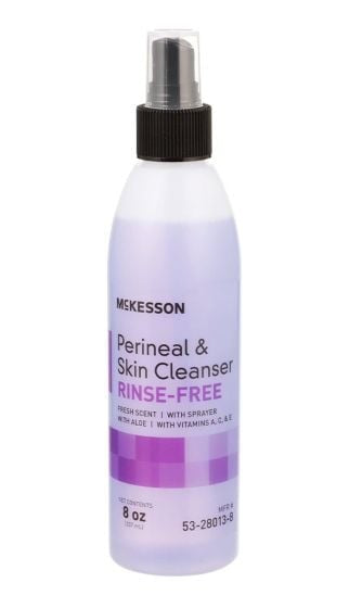 The 8 oz McKesson Perineal and Skin Cleanser comes in a sleek purple and white bottle with a sprayer. It is labeled "Rinse-Free" and offers a fresh scent with aloe, vitamins A, C, and E. The bottle is elegantly finished with a black cap.