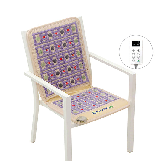 The TAJ-Mat™ Chair 4018 Firm - Photon PEMF InfraMat Pro® by HealthLine, embellished with multicolored stones, is placed on a white chair. This therapeutic design uses natural therapies to target back pain. An inset image features a remote control that allows for setting adjustments to deliver personalized comfort.