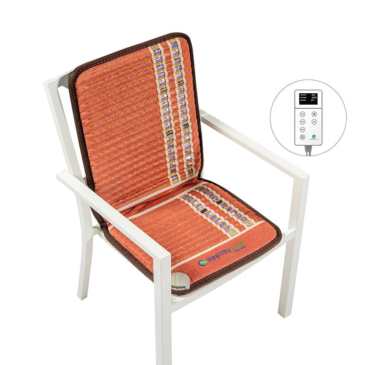 The HealthyLine TAO-Mat® Chair 4018 Firm is a white chair designed to relieve back pain, featuring an orange therapeutic heating pad with embedded stones. It includes a remote control for adjusting settings.