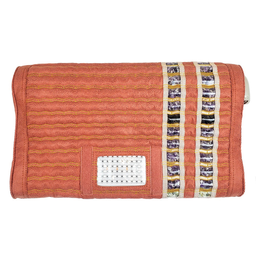 A rectangular coral clutch with textured waves, white bead accents, and vertical purple, gold, and white strips—ideal for carrying your HealthyLine TAO-Mat® Pillow Soft – Photon Matrix PEMF InfraMat Pro® in style.