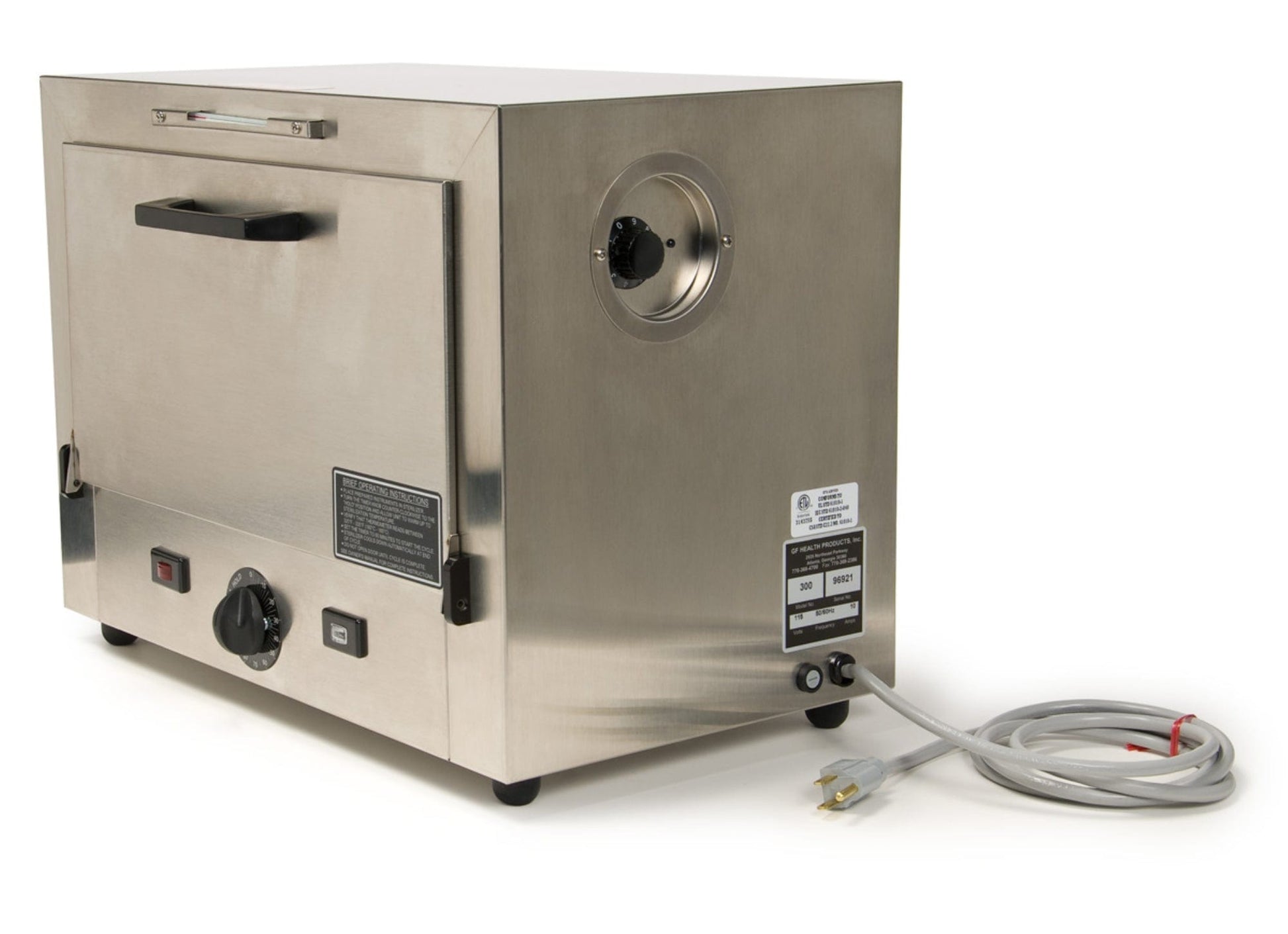 The Graham Field Stainless Steel Dry Heat Sterilizer, equipped with a black handle, control knobs, and power cord, serves as an effective sterilizing solution. This rectangular device includes visible buttons and rests on small feet, showcasing a sleek reflective finish perfect for sterilizing sharp instruments.