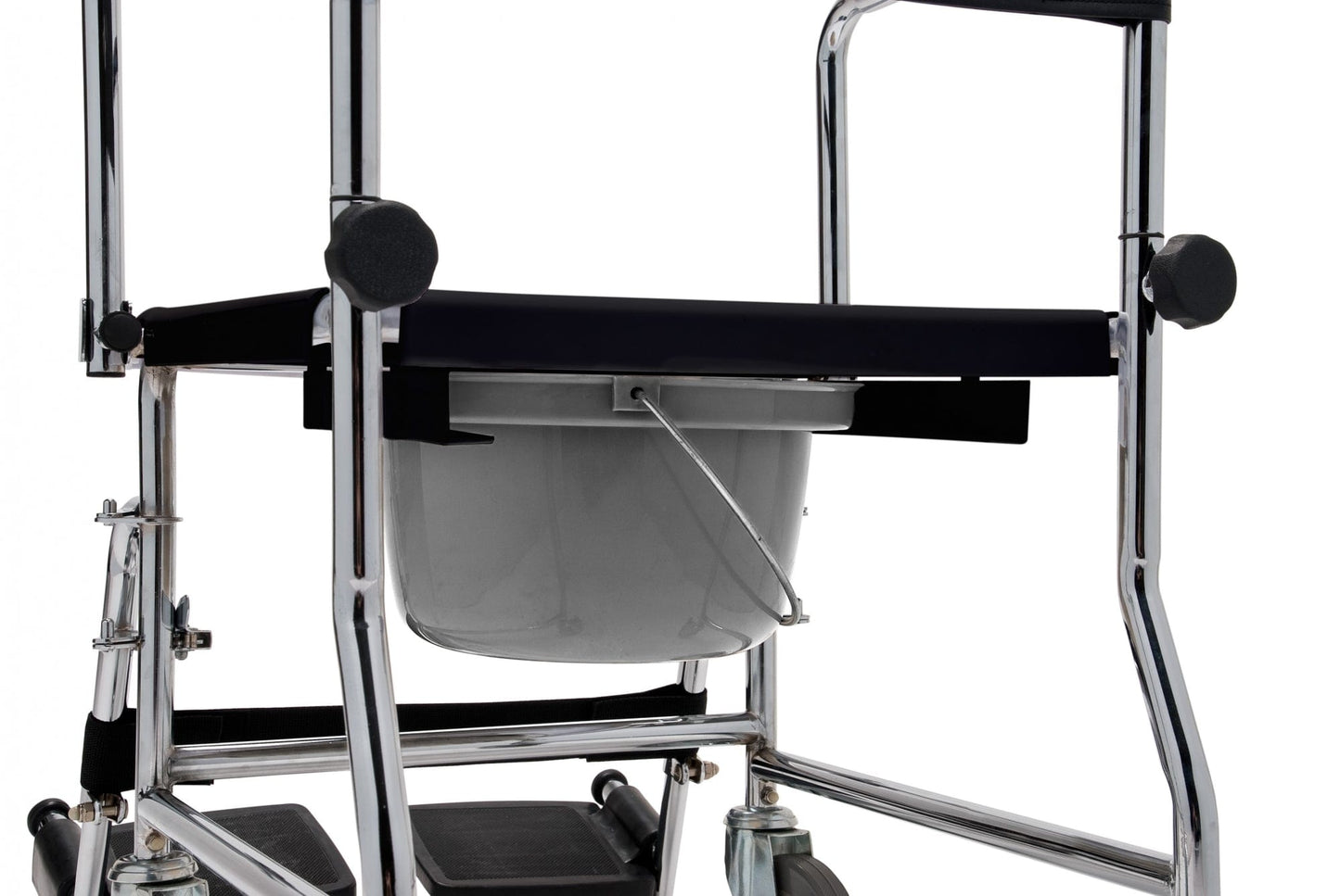 A close-up of the Lumex Drop Arm Versamode by Graham Field shows a metal commode chair with black seat and armrests, easy maneuverability, multiple functions, and a removable white plastic bucket beneath. The background is white.