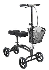 The Drive Medical Dual Pad Steerable Knee Walker with Basket is a crutch alternative featuring four wheels, handlebars, a padded knee rest, and a front wire mesh basket for easy mobility.