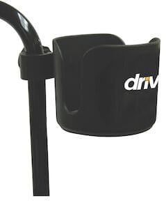 Black Universal Cup Holder by Drive Medical attaches to a pole; features partial white “dri” text from the brand logo on its side.
