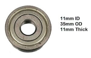 Close-up of the Drive Medical Rear Axle Bearing for Silversport Wheelchair, ideal with precise dimensions: 11mm ID, 35mm OD, and 11mm thickness. Displayed against a plain white background.