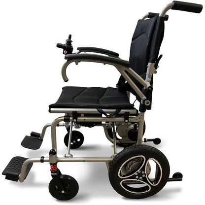 The Journey Air Power Wheelchair by Journey Health & Life Style is a modern foldable electric chair with a black seat, armrests, footrests, joystick on the right armrest, and large rear wheels for easy mobility.
