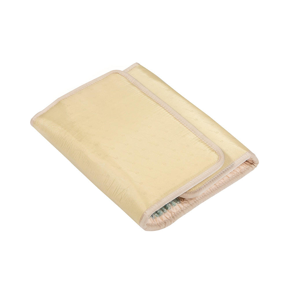 The Rainbow Chakra Mat™ Small 4020 Firm by HealthyLine features a light yellow design with a subtle dotted pattern and visible edge binding. It's soft, plush, and enhanced with far-infrared rays to envelop you in warmth and comfort.