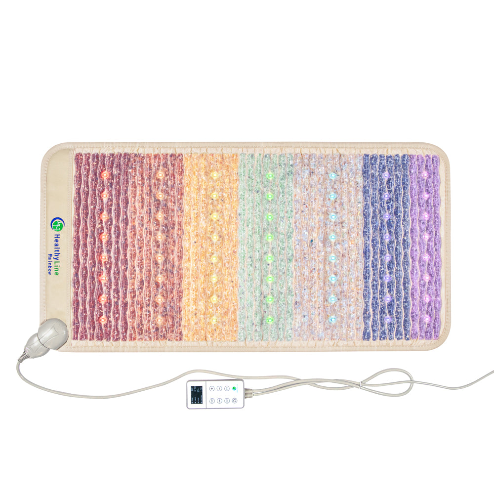 The Rainbow Chakra Mat™ Small 4020 Firm - Photon PEMF Inframat Pro® 3rd Edition by HealthyLine features a textured red-to-purple gradient surface enhanced with gemstones and utilizes therapeutic far-infrared rays, controlled via a corded device.
