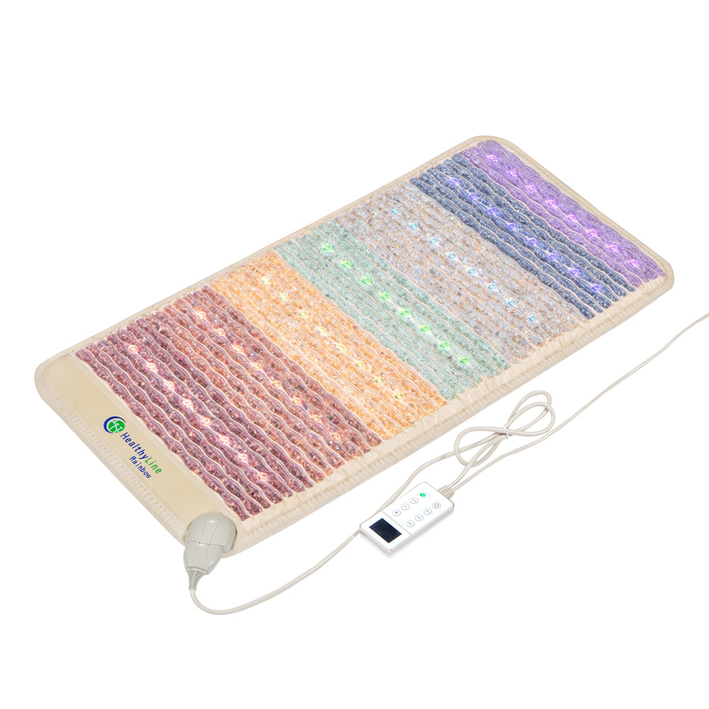 The Rainbow Chakra Mat™ Small 4020 Firm - Photon PEMF Inframat Pro® 3rd Edition by HealthyLine is a colorful, rectangular mat with a textured gradient surface. It has an attached control unit with buttons and display, using far-infrared rays for therapeutic relief and features a power cord.