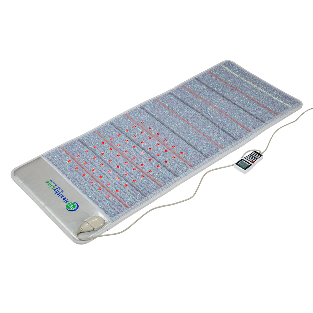 The Platinum Aura Mat Full Pro PLUS 7428 Firm by HealthyLine has a rectangular design with red light therapy dots, a textured gray surface, and amethyst aura gemstones. It connects to a control unit with a digital display, featuring the brand logo discreetly in the corner.