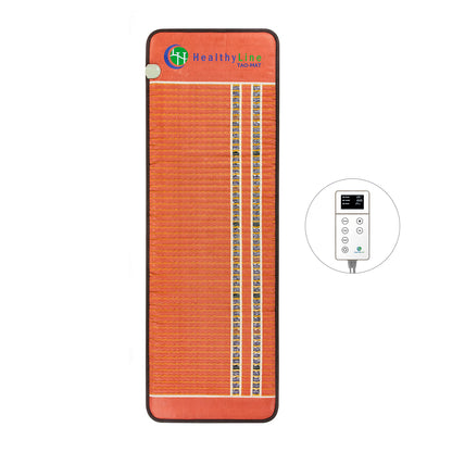 The TAO-Mat® Full 7224 Firm by HealthyLine is an orange rectangular mat with a pebble-like gemstone pattern. It features a small round control panel with buttons and a digital display, integrating far infrared technology for optimal wellness benefits.