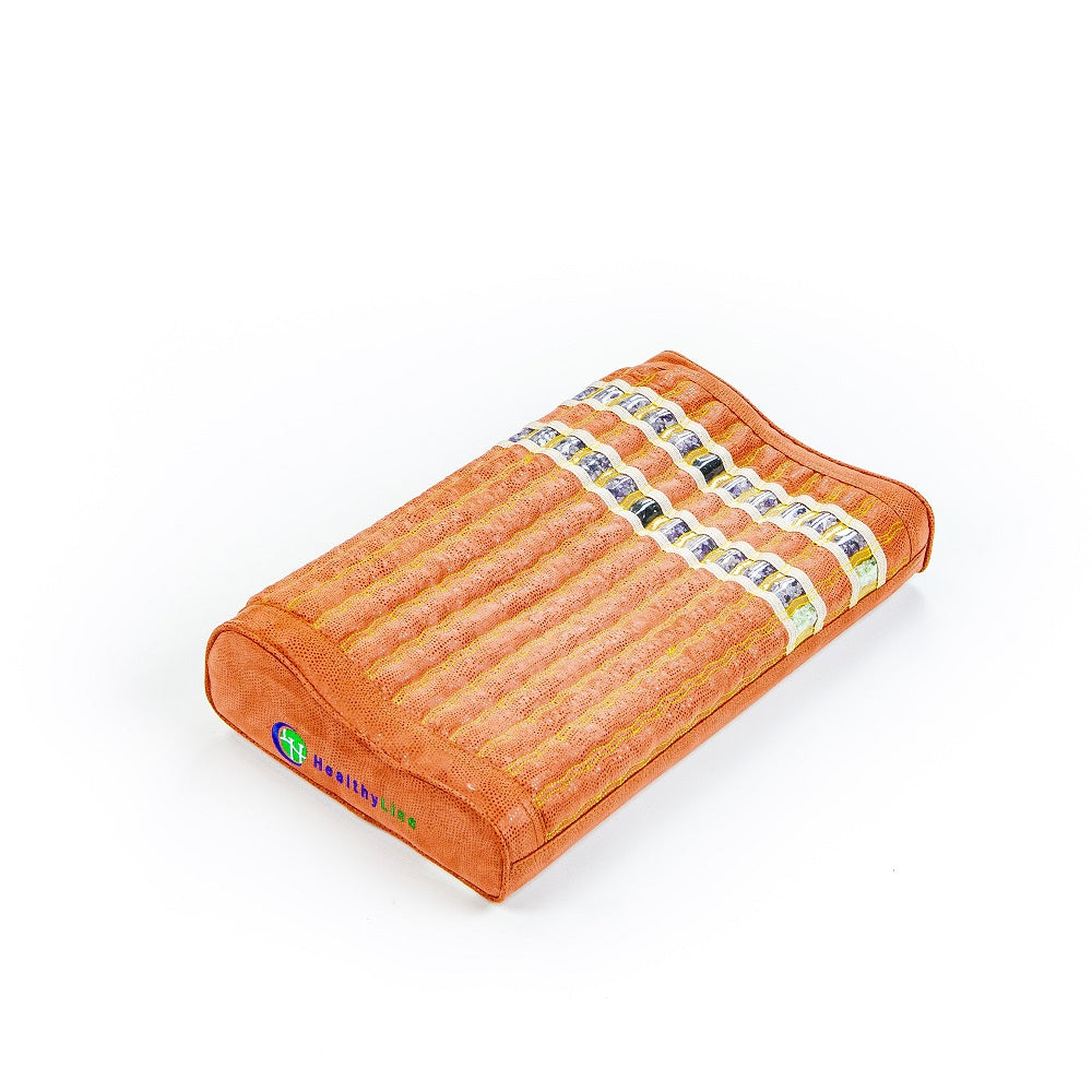 The TAO Mat Pillow with Heat by HealthLine is an orange pillow with a ribbed texture and cylindrical stones on one side, offering heated gemstones for comfort. A multicolored logo decorates one end on a plain white background.