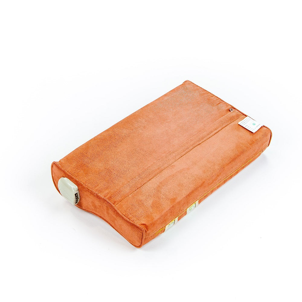The TAO mat Pillow with Heat by HealthLine features an orange rectangular design, textured fabric surface, memory foam for comfort, a white tag, and a loop on one side. It boasts minimalism and is displayed against a plain white backdrop.
