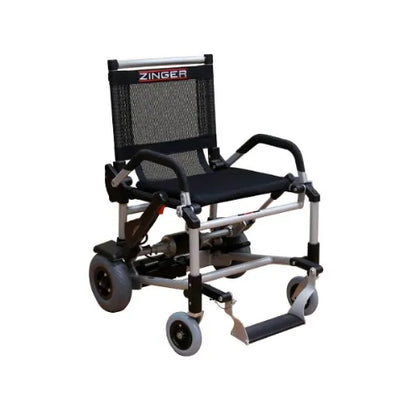 The Journey Health & Life Style Zinger Power Wheelchair is a compact, ADA-friendly, foldable chair with a black seat, mesh backrest, dual lever steering, four wheels, and a metal frame—designed for easy transport and accessibility.