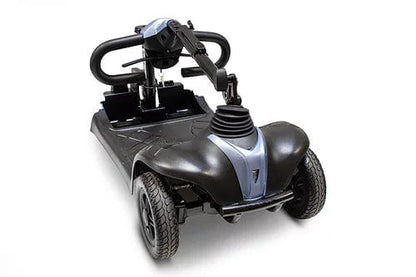 The EW-M39 Power Scooter by E-Wheels is a black and gray mobility scooter base without the seat, highlighting its four wheels and handlebars. It has a sleek, compact design with a front control panel and a powerful battery for extended use.