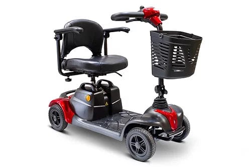 The EW-M39 Power Scooter by E-Wheels, in a striking red, features four wheels with a robust battery for long trips. It includes a comfortable black seat with armrests, handlebars, and a front storage basket. Its wireless design is supported by anti-tip wheels on a grey platform for stability.