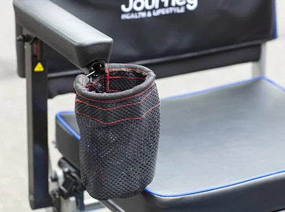 A black mesh cup holder with red stitching is attached to the armrest of a So Lite Scooter by Journey Health & Life Style, highlighting its lightweight design. The seat and backrest feature the Journey logo.