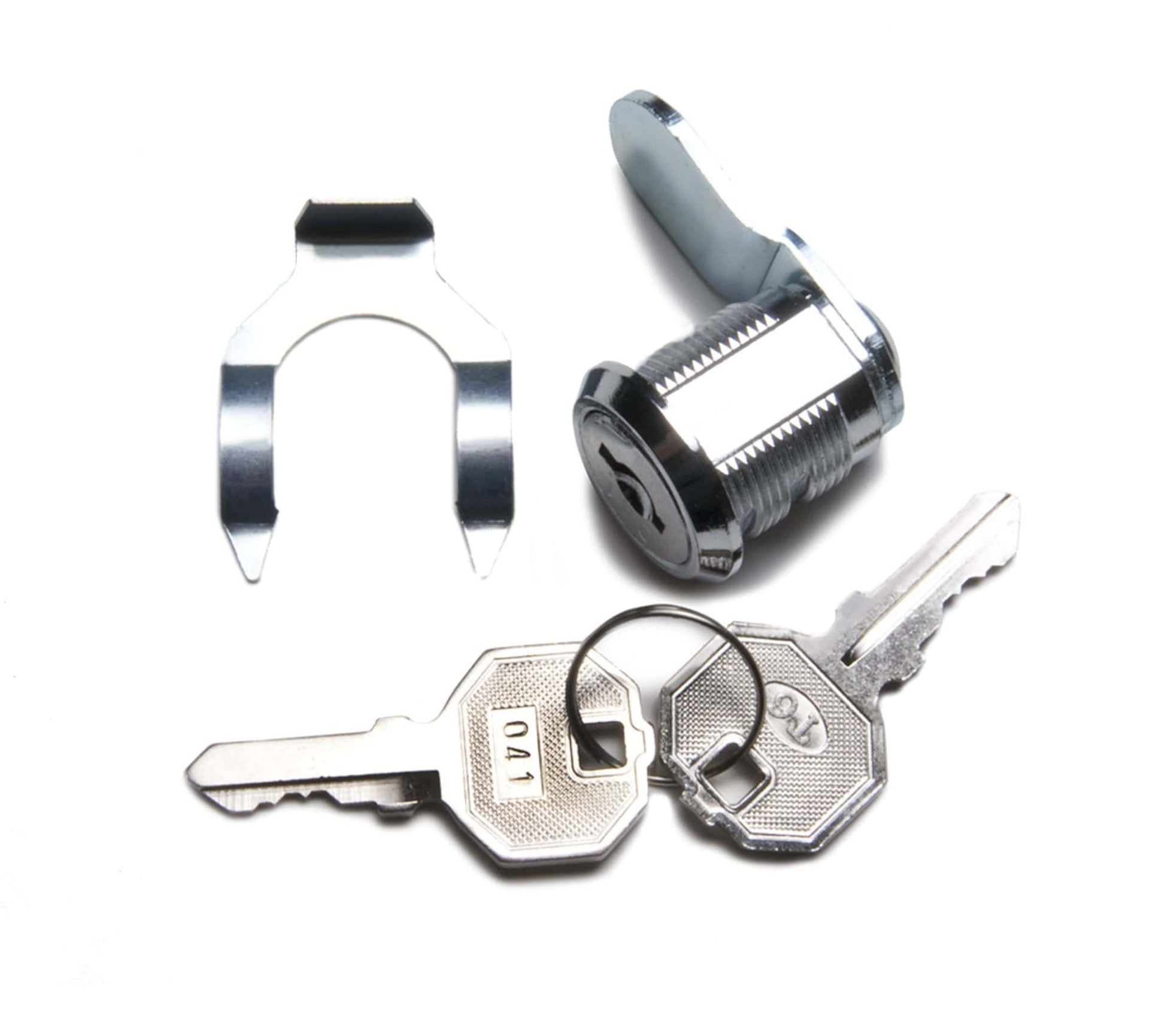 The scene showcases a cam lock with two silver keys and a metal clip, echoing the precision synonymous with Graham Field's Physician Mechanical Beam Scale with Wheels. The cylindrical lock boasts a flat, rotating mechanism, while one hexagonal-headed key is embossed with "704," all arranged on a pristine white backdrop.