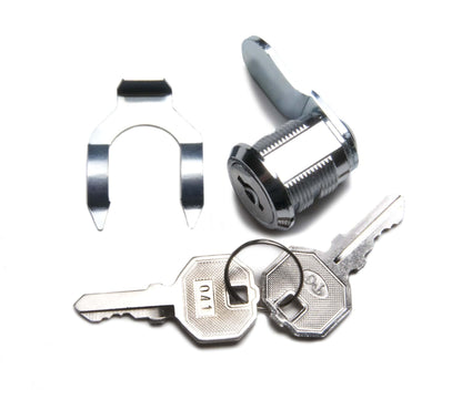 The scene showcases a cam lock with two silver keys and a metal clip, echoing the precision synonymous with Graham Field's Physician Mechanical Beam Scale with Wheels. The cylindrical lock boasts a flat, rotating mechanism, while one hexagonal-headed key is embossed with "704," all arranged on a pristine white backdrop.