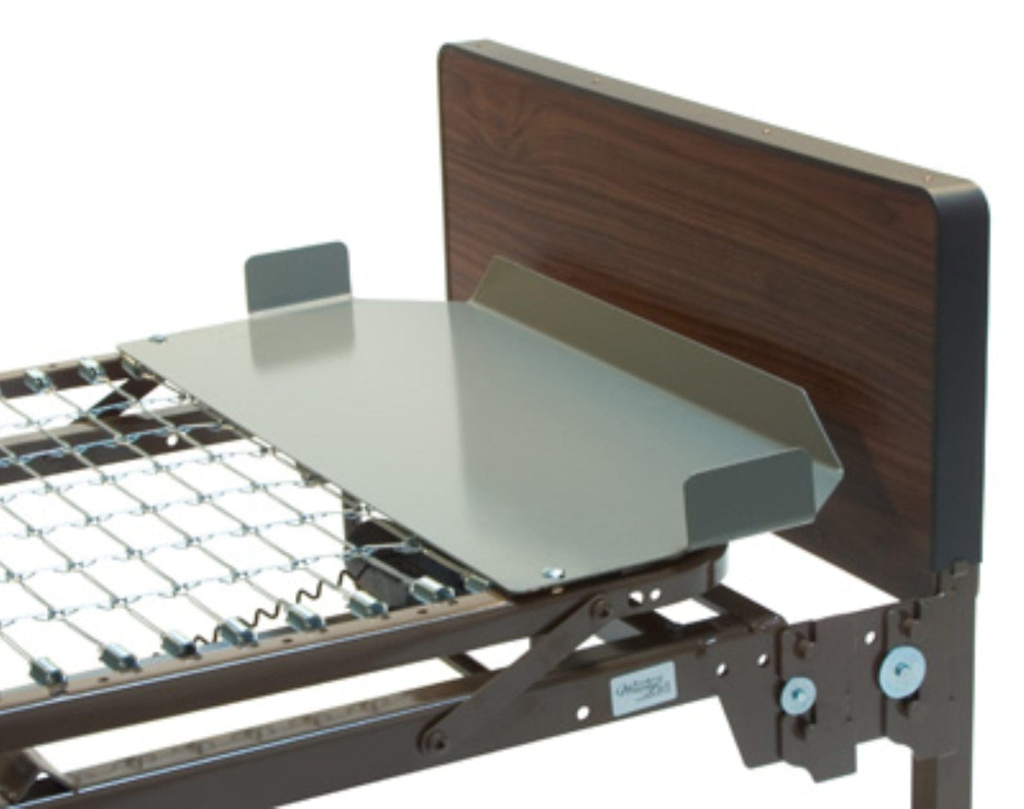 The Graham Field Patriot Homecare Beds, Semi-Electric, proudly MADE IN THE USA, feature a durable metal frame with an elegant dark wooden headboard. They include a grid sleep surface and an adjustable shelf for improved patient comfort and support.