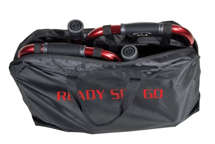 A Drive Medical Travel Walker with Folding Legs, its wheels and collapsible legs partly visible, carried in a black bag featuring "READY SET GO" in red.